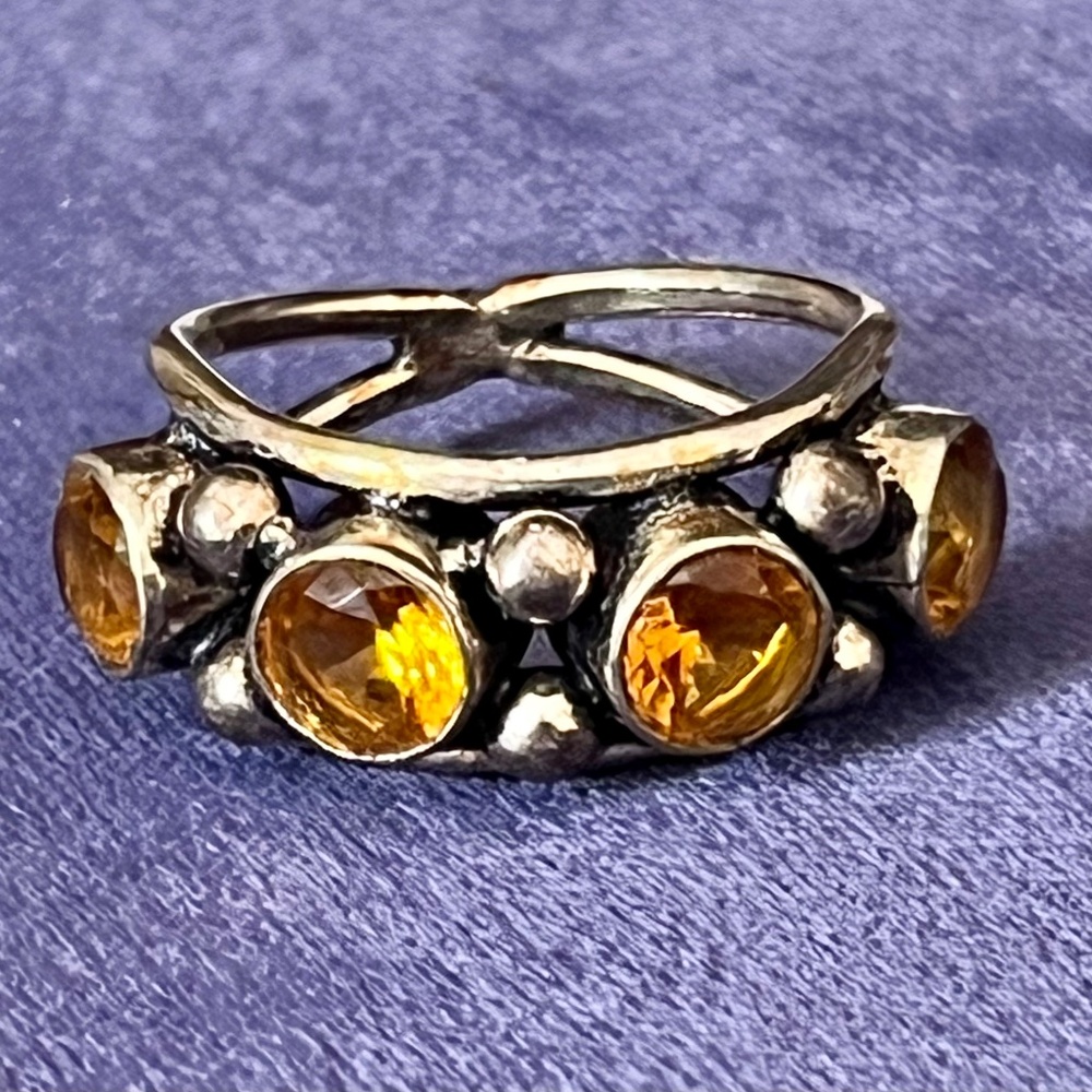 Sterling Silver Ring with Four Yellow Stones